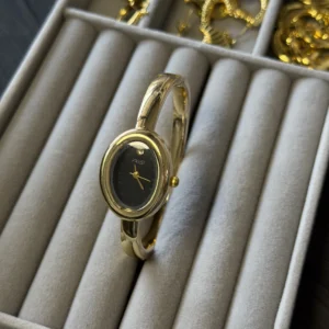 Ellipse shape cuff watch gold Ellipse shape cuff watch gold