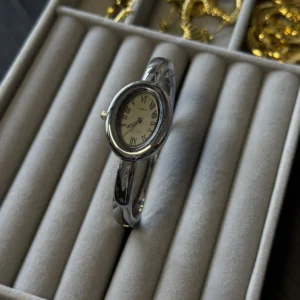 Ellipse shape cuff watch