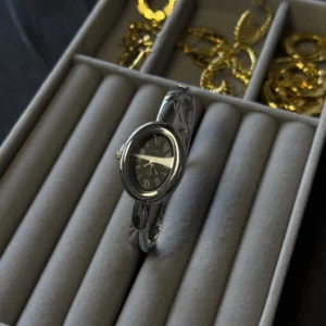 Ellipse shape cuff watch