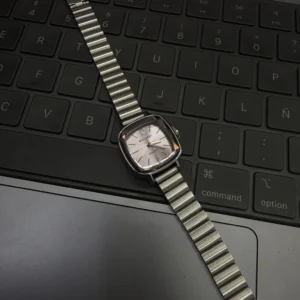 Sunburst pink square watch