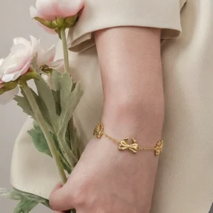 Triple bow station bracelet